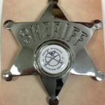 Sheriffs Badge with the Depot Logo / Badge des shérifs avec le logo du dépôt